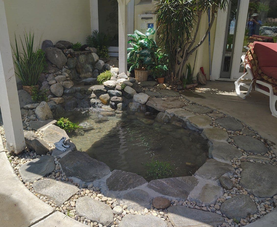 Gallery photos for Stunning Backyard Pond Transformation: Image #1