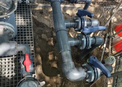 Industrial plumbing system with valves and pipes, showcasing a durable design and functionality.